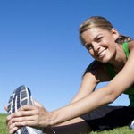 Attractive Woman stretching before Fitness and Exercise