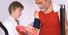 Senior is being observed by doctor after training