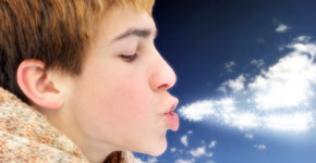 teenager blowing magic stars