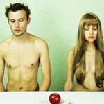 Two nude lovers with apple