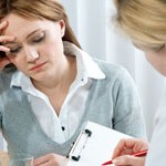 young woman in a conversation with the psychologist