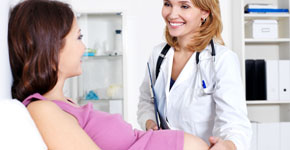 Doctor with pregnant woman