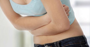 Teen woman with stomach ache