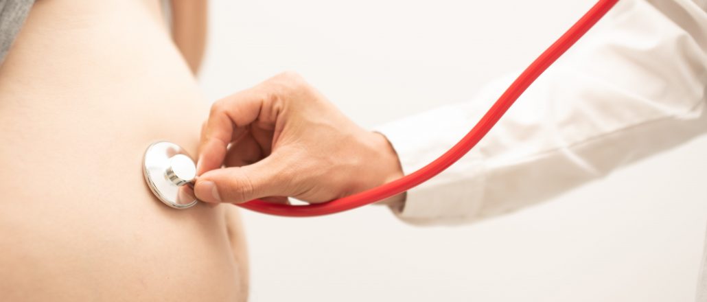 doctor-using-stethoscope-listen-baby-in-pregnant-woman-for-checking-heartbeat-of-infant